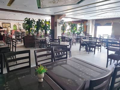 Commercial Building 10000 Sqft Covered Area 6 Washrooms Kitchen Area Tile Flooring Huge Parking Space Rent