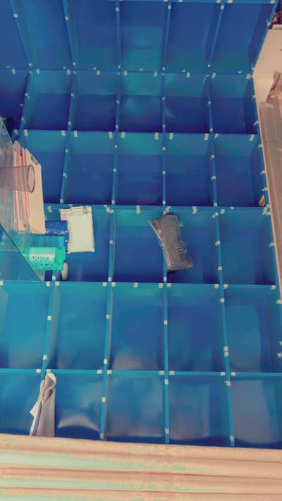 shelve racks and glass and wood counter