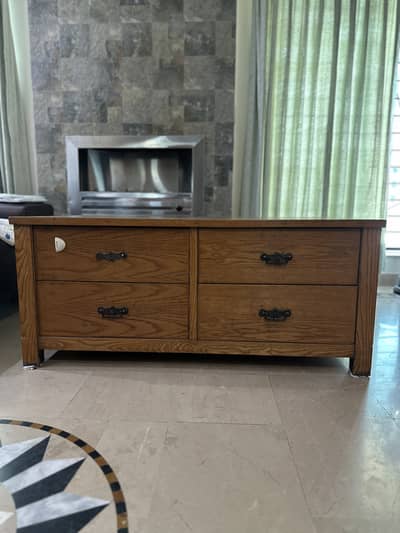 Center table with 4 drawers available. Original wood. Heavy table.