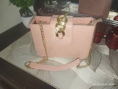 handbag light pink colour