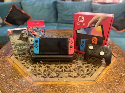 Nintendo Switch Oled with pro controllers,games,accessories