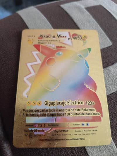 A golden pokemon card of Pikachu Vmax ps 4650