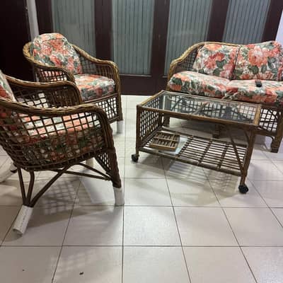 Cane sofa 4 seater with glass top table