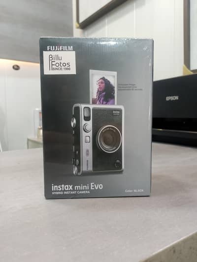 INSTAX Mini EvO. ( Hybrid Instant Camera  )