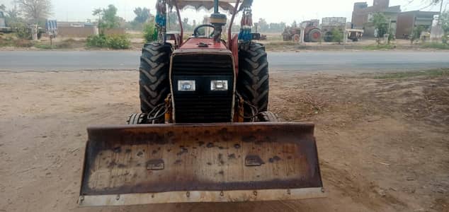 Massey Ferguson 375 model 1992 with front blade