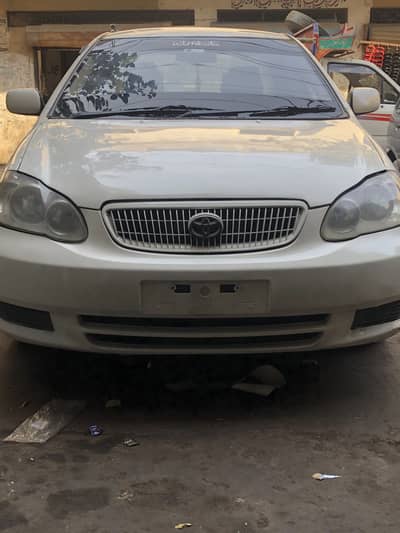 Corrolla 2004 white color good confition