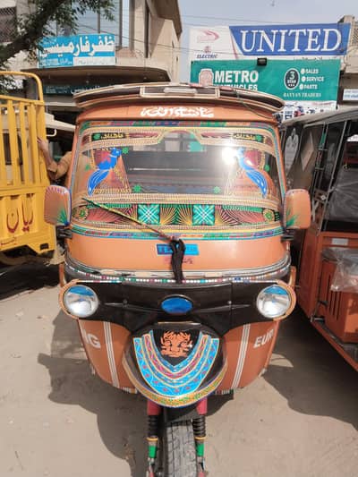 AUTO RIKSHA TEZRAFTAR 9seater
