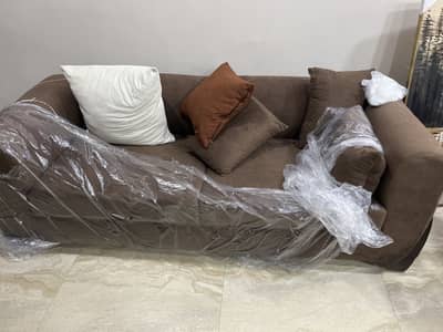 Brown sofa made up of  buskskin fabric  Qty 2