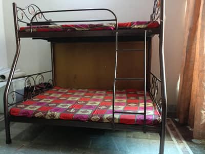 it's a bunk bed made of solid iron