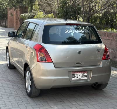 Suzuki Swift DLX 1.3 ABS 2016. Almost Genuine.