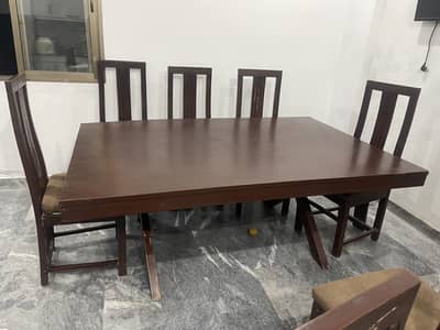 Wooden dining table with 8 chairs