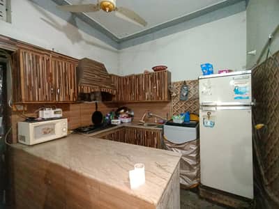 5 Marla Triple Storey Semi Commercial Facing Park House with 2 Shops on 40 Feet Road