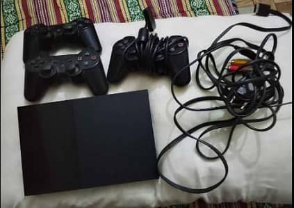 playstation 2 with 3 controllers