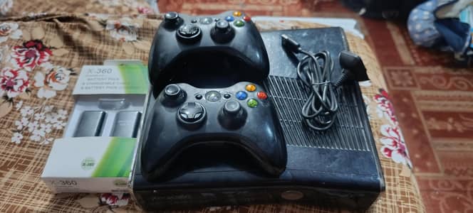 Xbox 360 Slim Jtag 250gb hard with 2 wireless controller