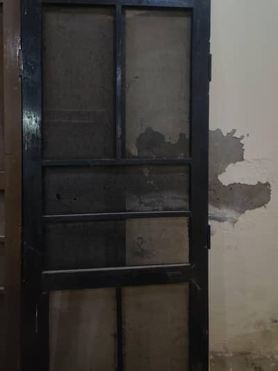 iron stairs and wooden door