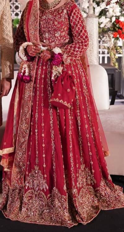 brand new bridal lehnga  with extra flayer  in deep red .