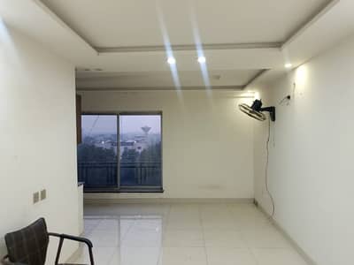 2 BEDROOM APARTMENT FOR RENT IN BAHRIA TOWN LAHORE.