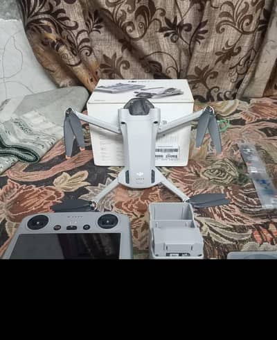 Drone DJI mini 3 pro urgent sale contact OLX