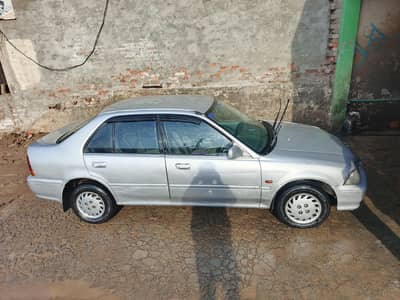 Honda city 99 model original apny Saman main hai gadi