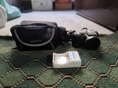 Olympus SP-600UZ + battery + charger + bag