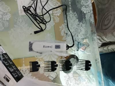 Hair and beard trimmer