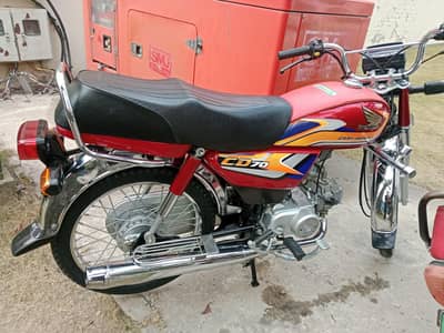 Honda CD 70 red color