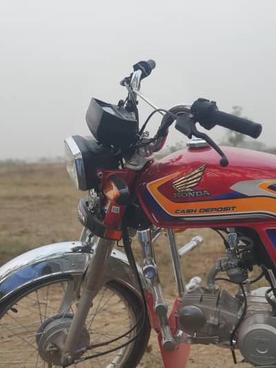 Honda CD70 2025 Red – 11,699 KM – Genuine Condition – Swabi Number