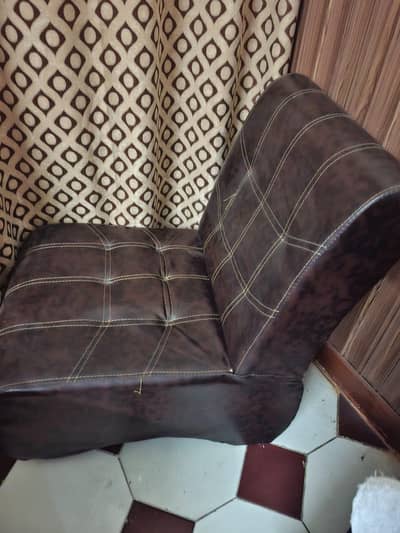 one simple sofa and two wooden foldable chair just like new