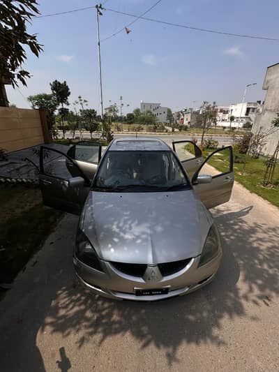 Lancer Family Car executive better than Mehran Cultus Coure