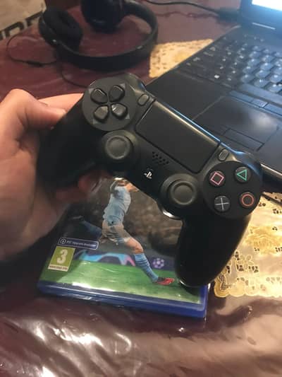 1 original controller and FC 24