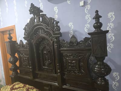 bed and dressing side table