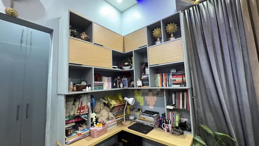 Modern Corner Study Table with Bookshelves and Storage