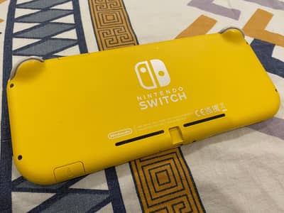 Nintendo Switch Lite 9/10 Condition