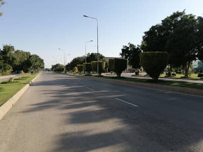 9 Marla on ground facing canal and canal road lahore with 50" road on its front side and 50" road on its back side along with 30" and 20" dedicated parking , ready for construction. super hot thing in it is that the plot is open form. .