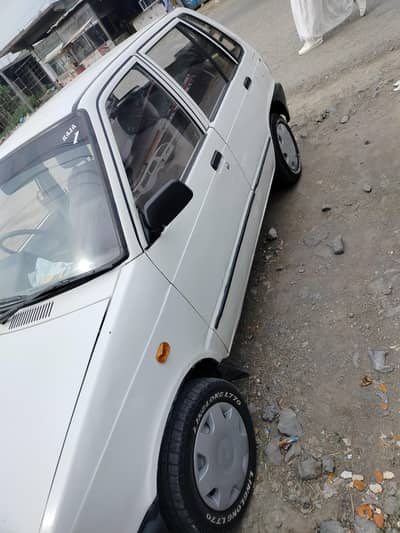 Suzuki mehran modal 2011 what app number 03170592131