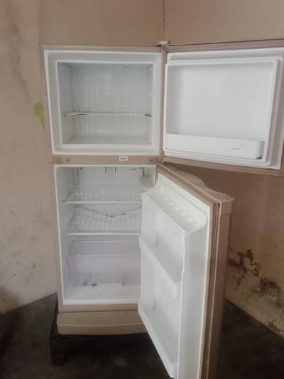 Double door small fridge.