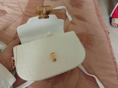 Limited leather gold trim handbag