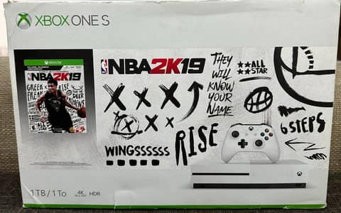 Xbox one s with 2 controllers, 12 games and charging station