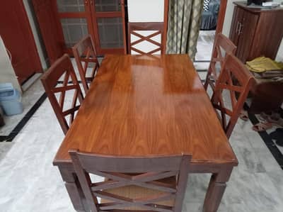 Wooden dining table and chairs