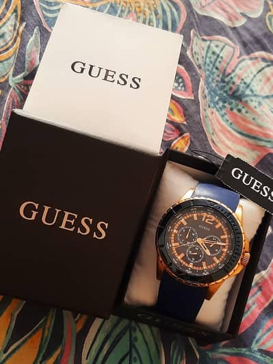 GUESS Men's U0485G1 Rose Gold-Tone Watch with Blue Silicone Band