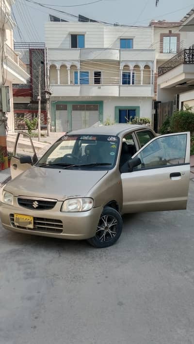 Alto 5 model car gold colour