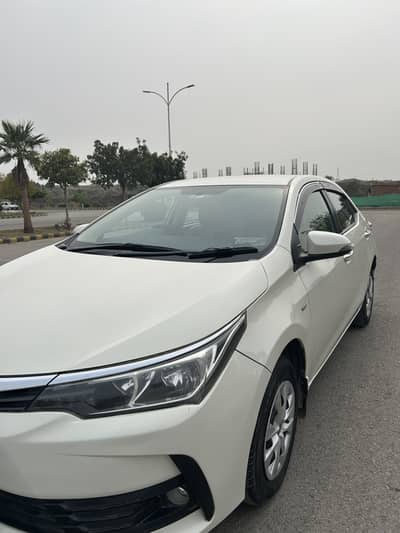 Toyota Corolla gli 2019 model white automatic  Islamabad register