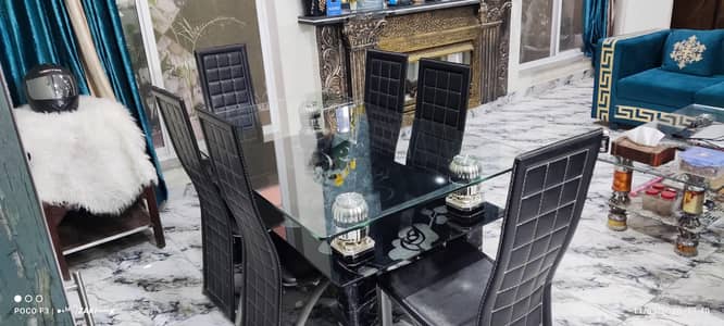 Luxury Glass dining table with 6 chairs