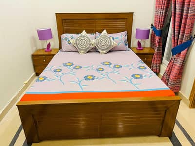 queen size double bed with side table