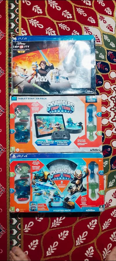 PS4 GAMES AND CAMERA ' Skylanders and disney infinity star war's