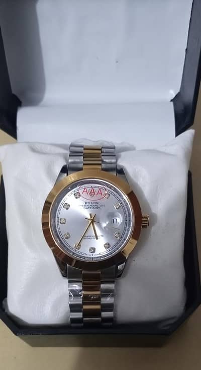 Rolex white diamond watch.