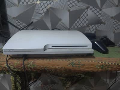 Ps3 plus 2 cantroller and 15 games imstalled