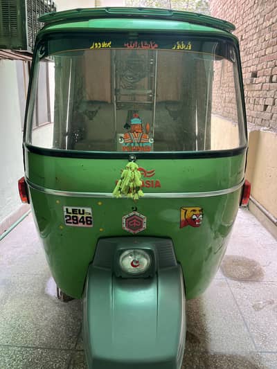 Auto Riksha new Asia green color 10 by 10 condition