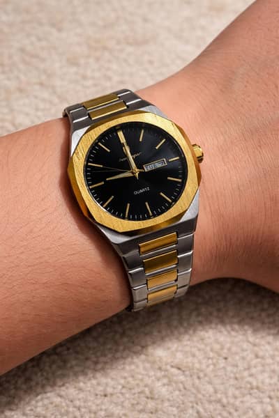 Branded golden watch with butterfly lock