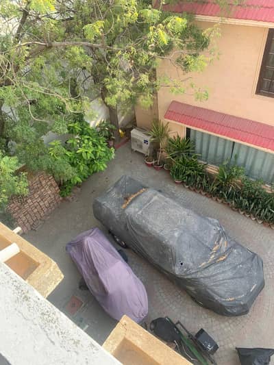 500+500 front & rear two old houses off Touheed, near Zamzama Park, 3 feet above road level